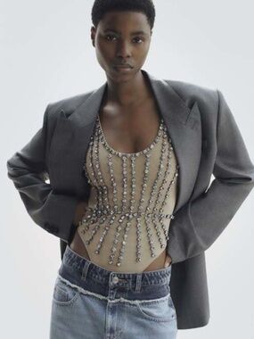 New sold out viral crystal body suit by H&M Stella McCartney